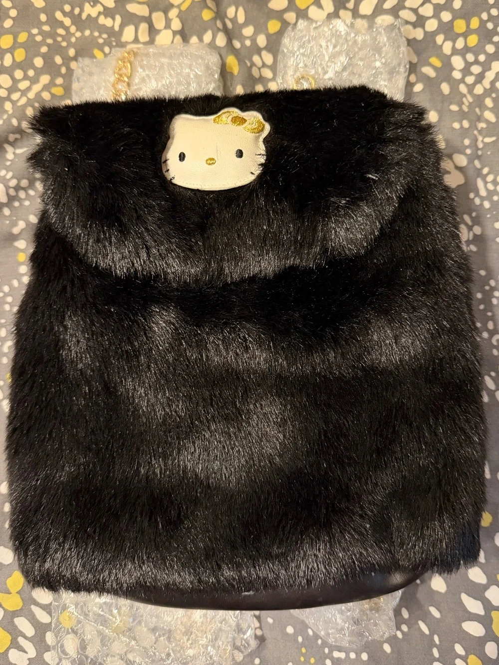Hello Kitty Black Faux Fur Shoulder Bag with Gold Bow Accent
